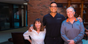 dr singh with doris and larry after dental procedure